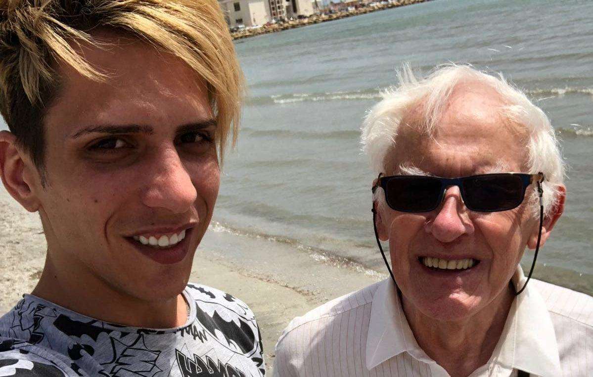 Florin and Philip on a beach in Alicante following their recent reconciliation