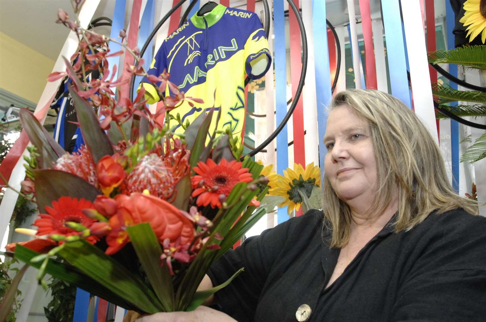 Canterbury florist Christine Luck with one of the bouquets for the winners of the stage