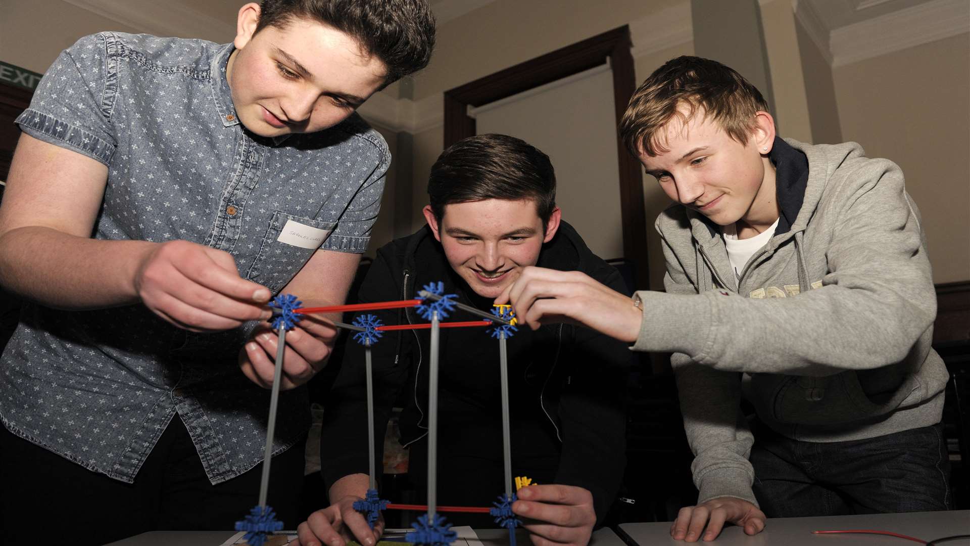 Sam Clark, Ryan Locke and Sam Nobbs help to build a wind turbine. Fun filled day for students to work alongside engineering and construction industry employers