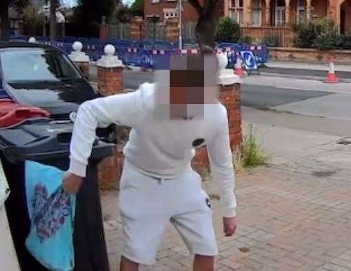 A man was caught on doorbell footage grabbing a bag of dirty nappies from behind a wheelie bin in Herne Bay