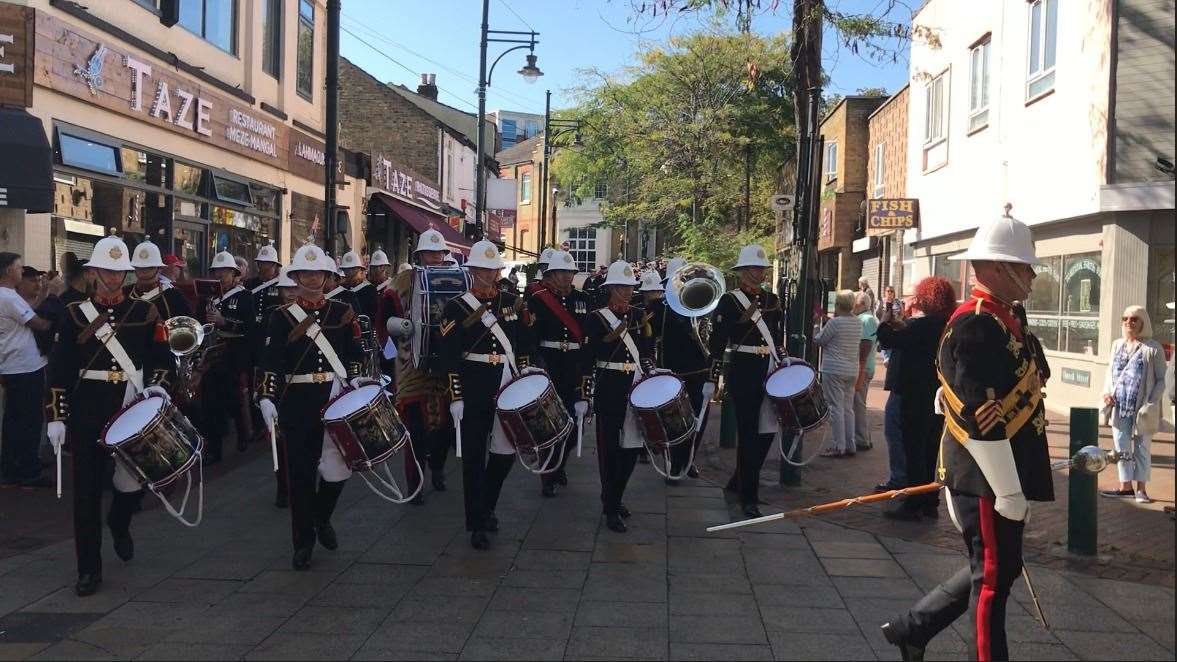 The Royal Marine Band lead the freedom parade, followed by the crew of HMS Medway