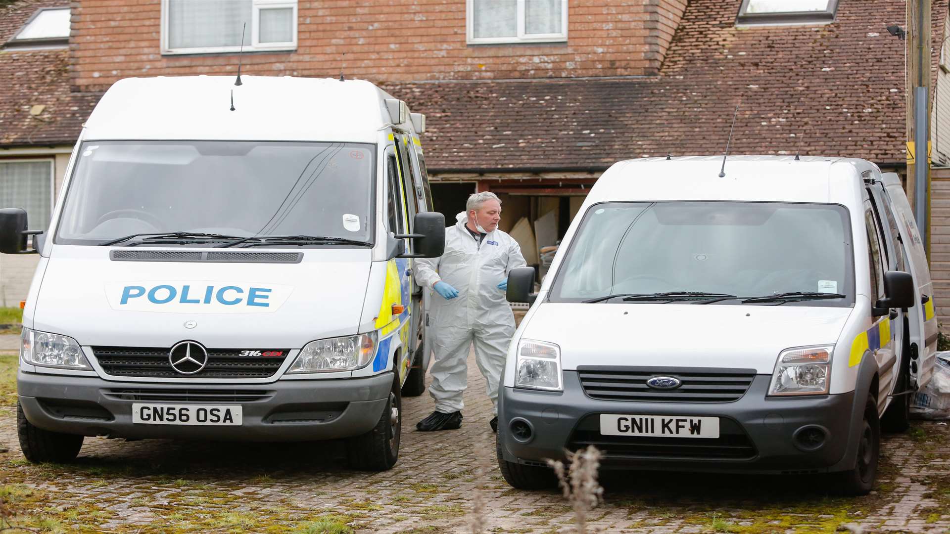 Police on the scene at Heartsay Bungalow, Biddenden after the discovery of Roy Blackman's body