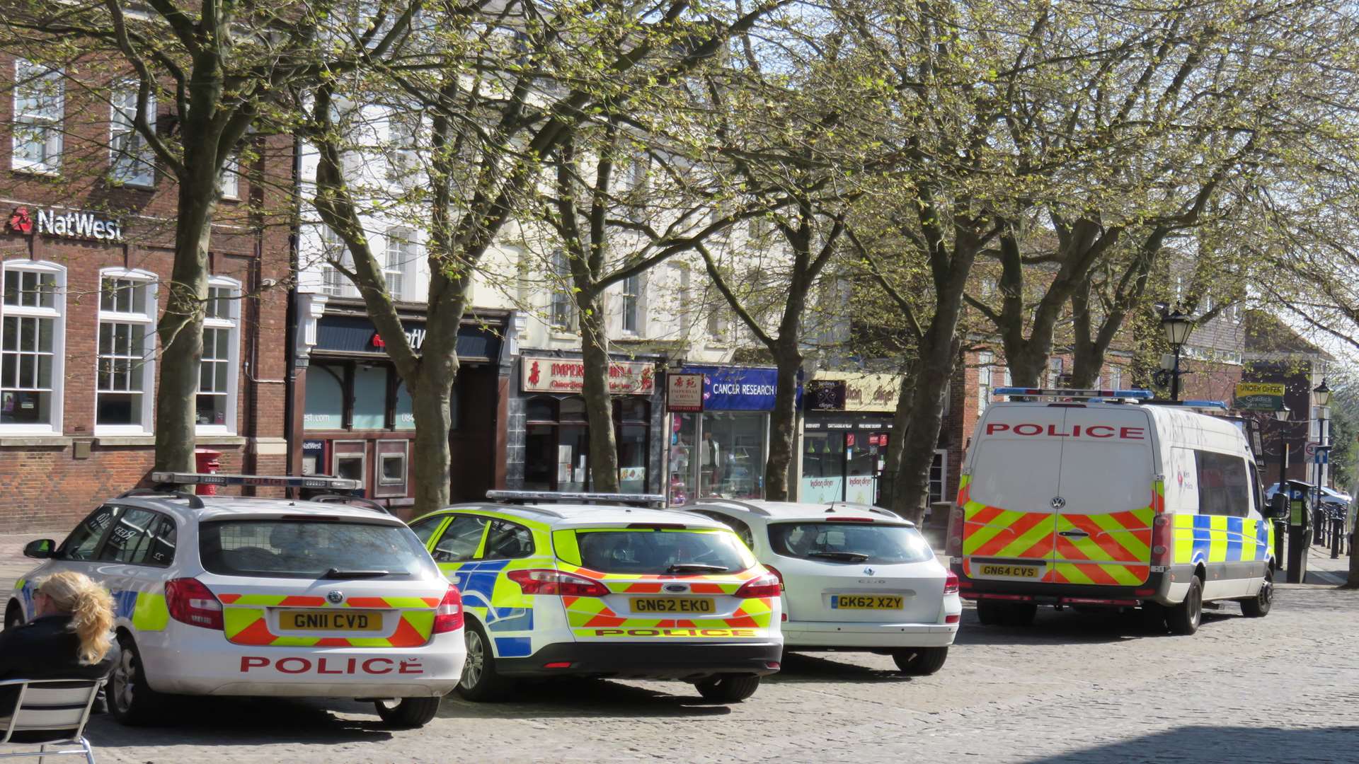 Police descended on Ashford High Street. Picture: Andy Clark