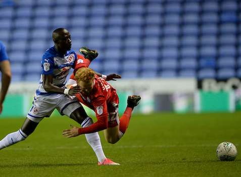 Connor Ogilvie battles for the ball at Reading Picture: Ady Kerry