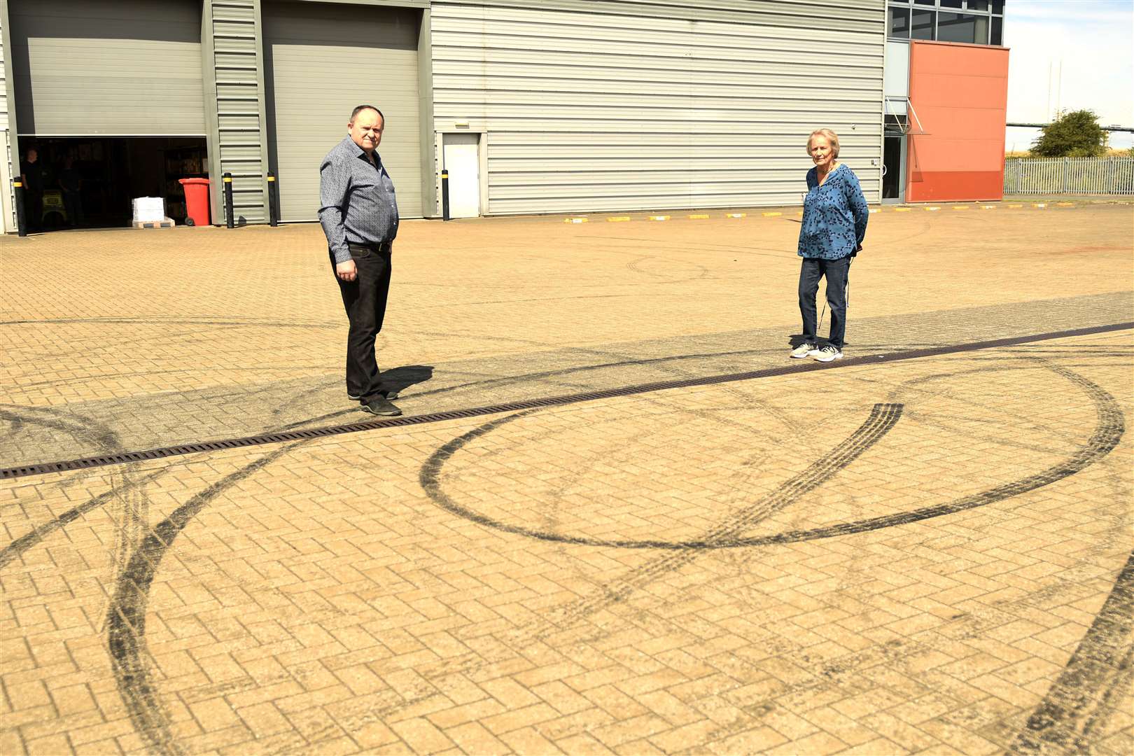 Councillors Peter Harman and Lesley Hawes continue to campaign for more action after "boy racers" targeted the Screwfix site in Crossways Boulevard. Picture: Barry Goodwin.