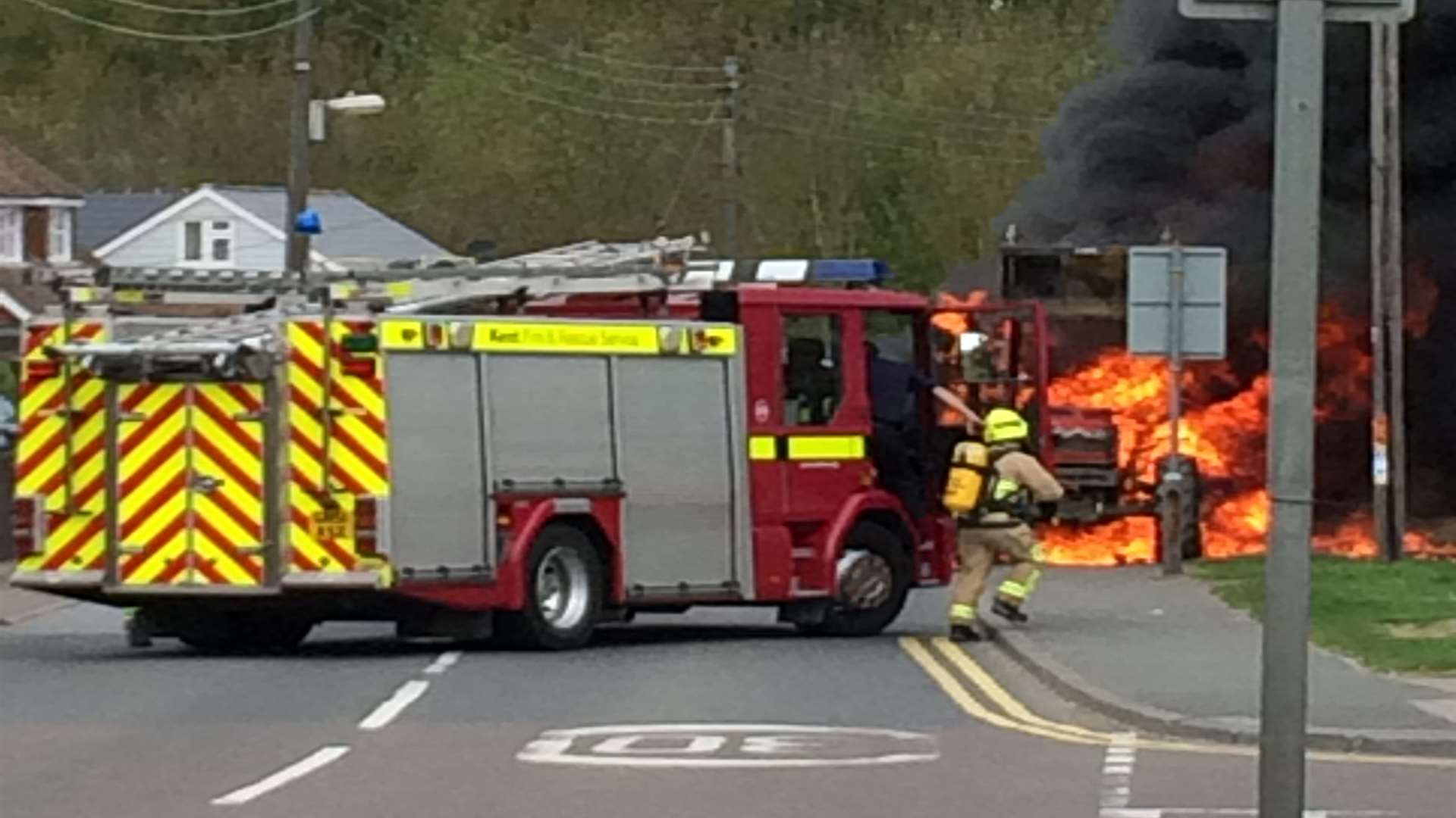 Firefighters tackling the blaze in Town Road, Cliffe Woods. Pic: Jason Stafford