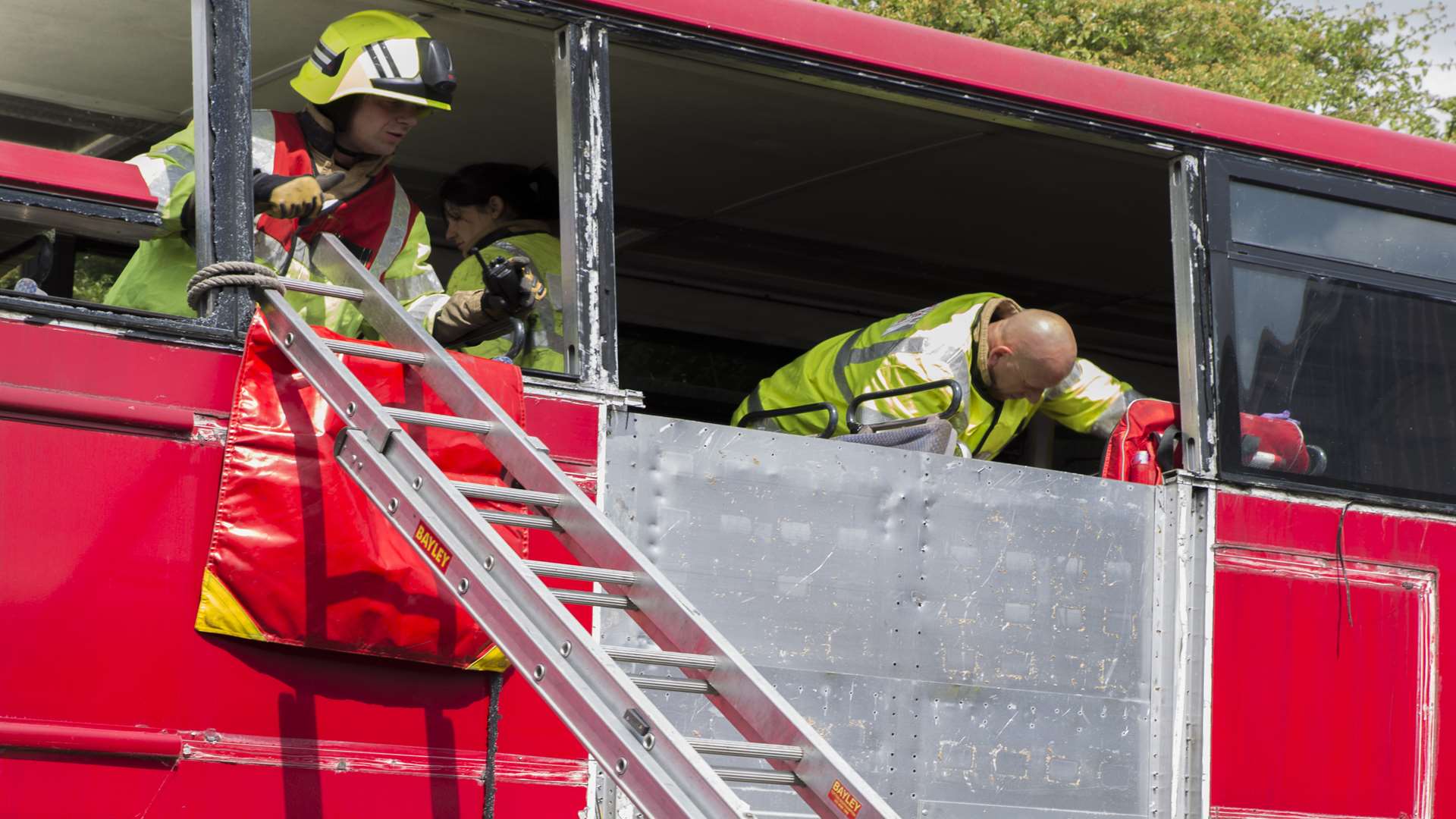 Firefighters assess the scene at the training exercise