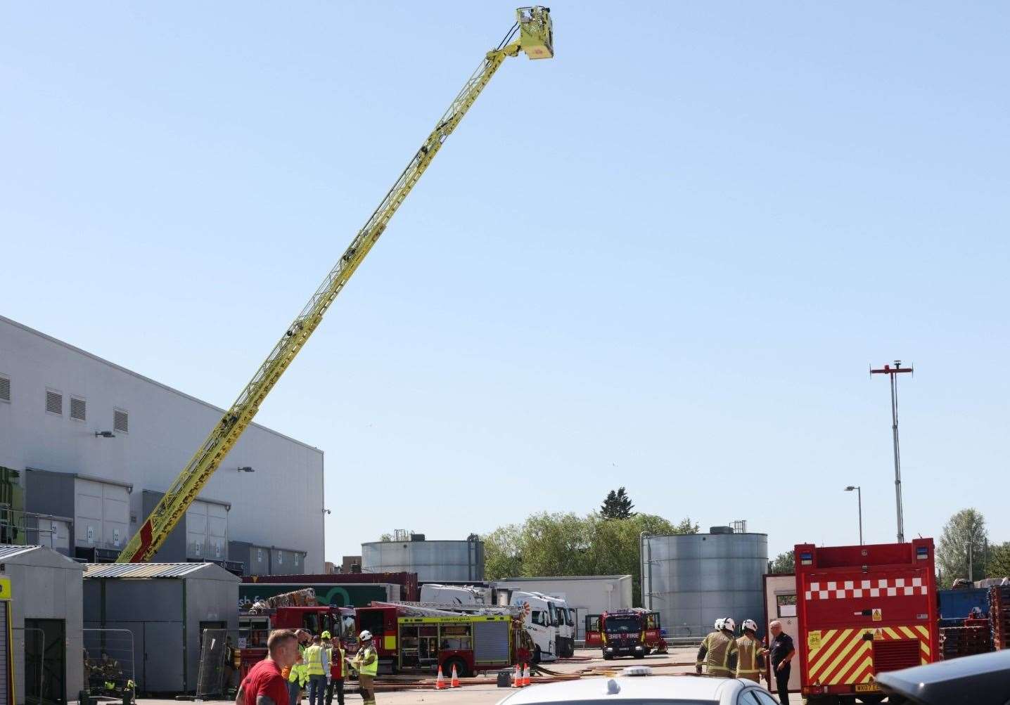 A crane is being use by firefighters at the scene. Photo: UKNIP