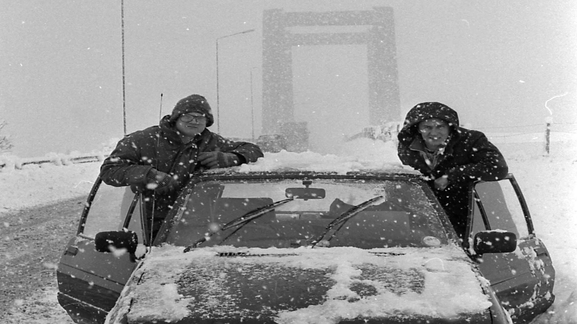 Reporters John Nurden and John Hammond brave the snow storm to cover the event. Picture: Barry Hollis