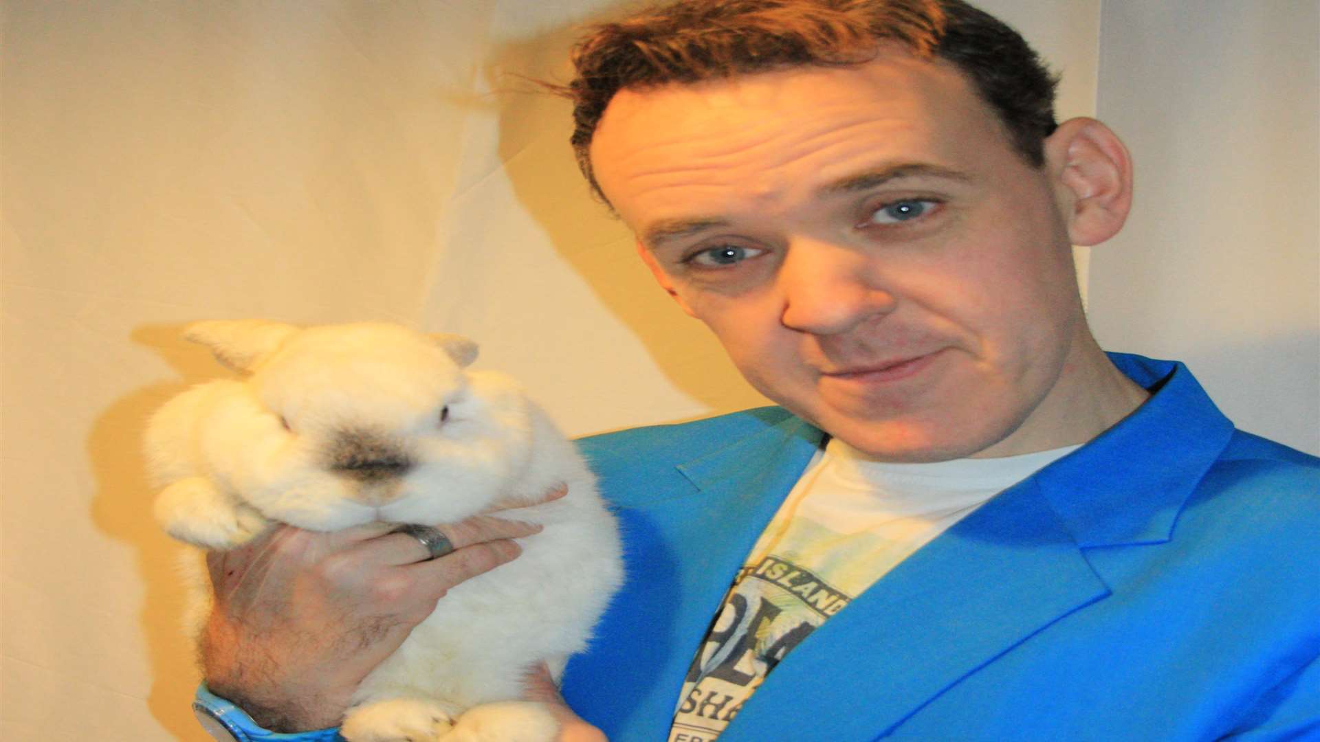 Magician and children's entertainer Phil Hoyles with Benji the rabbit who has gone missing