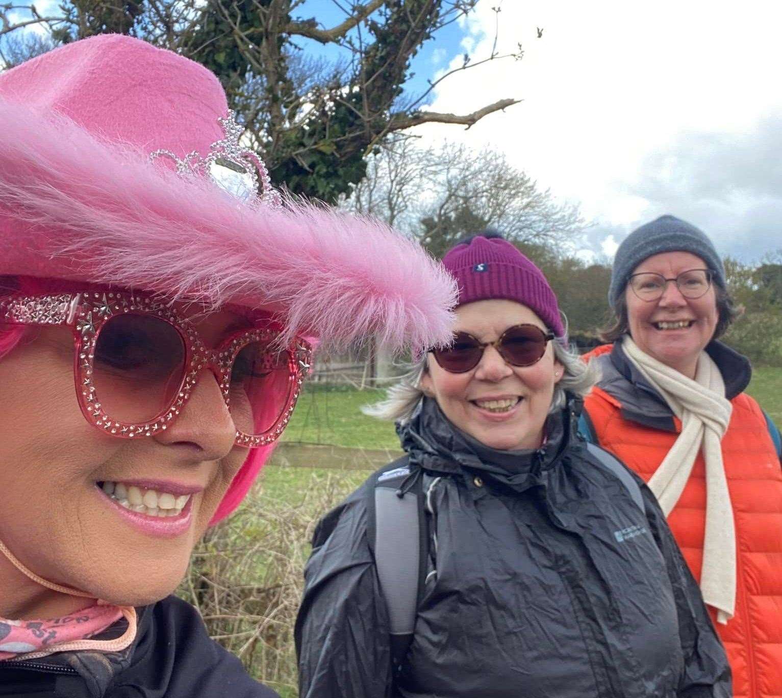 Organiser Kerry Banks takes a selfie with two walkers