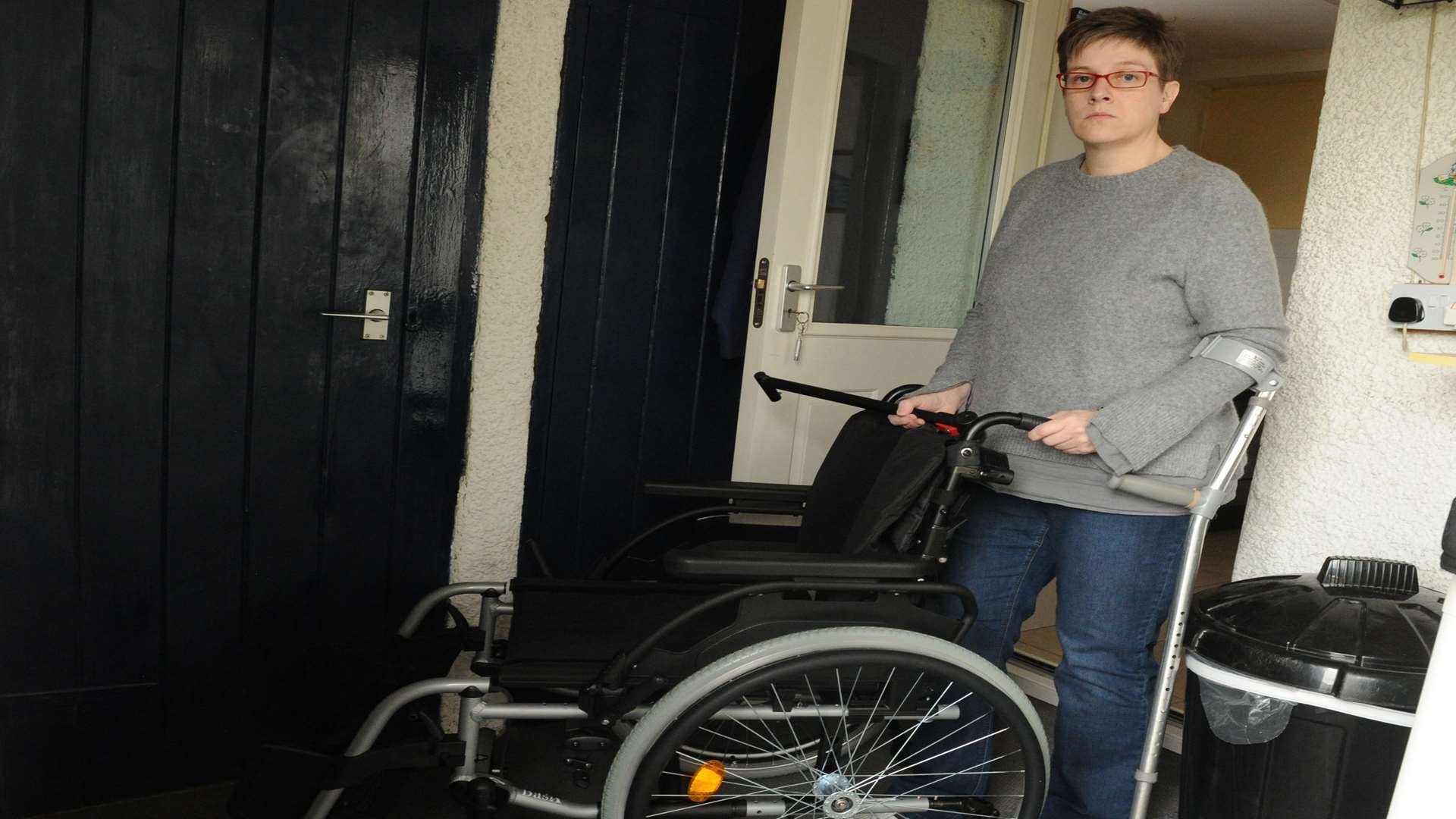 Clare Wadey at home with her wheelchair