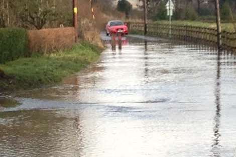 This road in Birling is made almost impassable by flooding. File picture