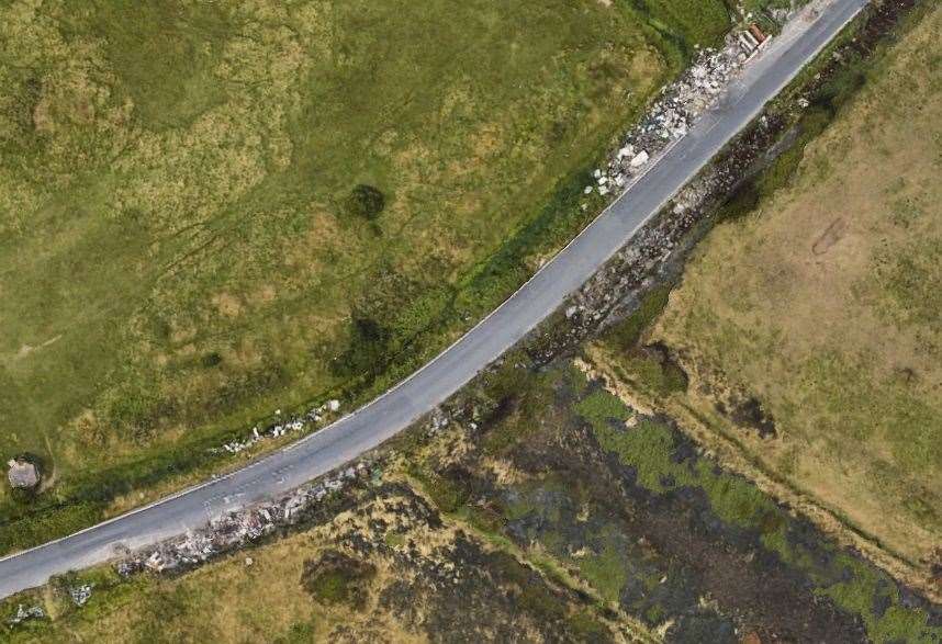 The fly-tipping along Wallhouse Road is so big it can be seen from Google Earth. Photo: Google Earth