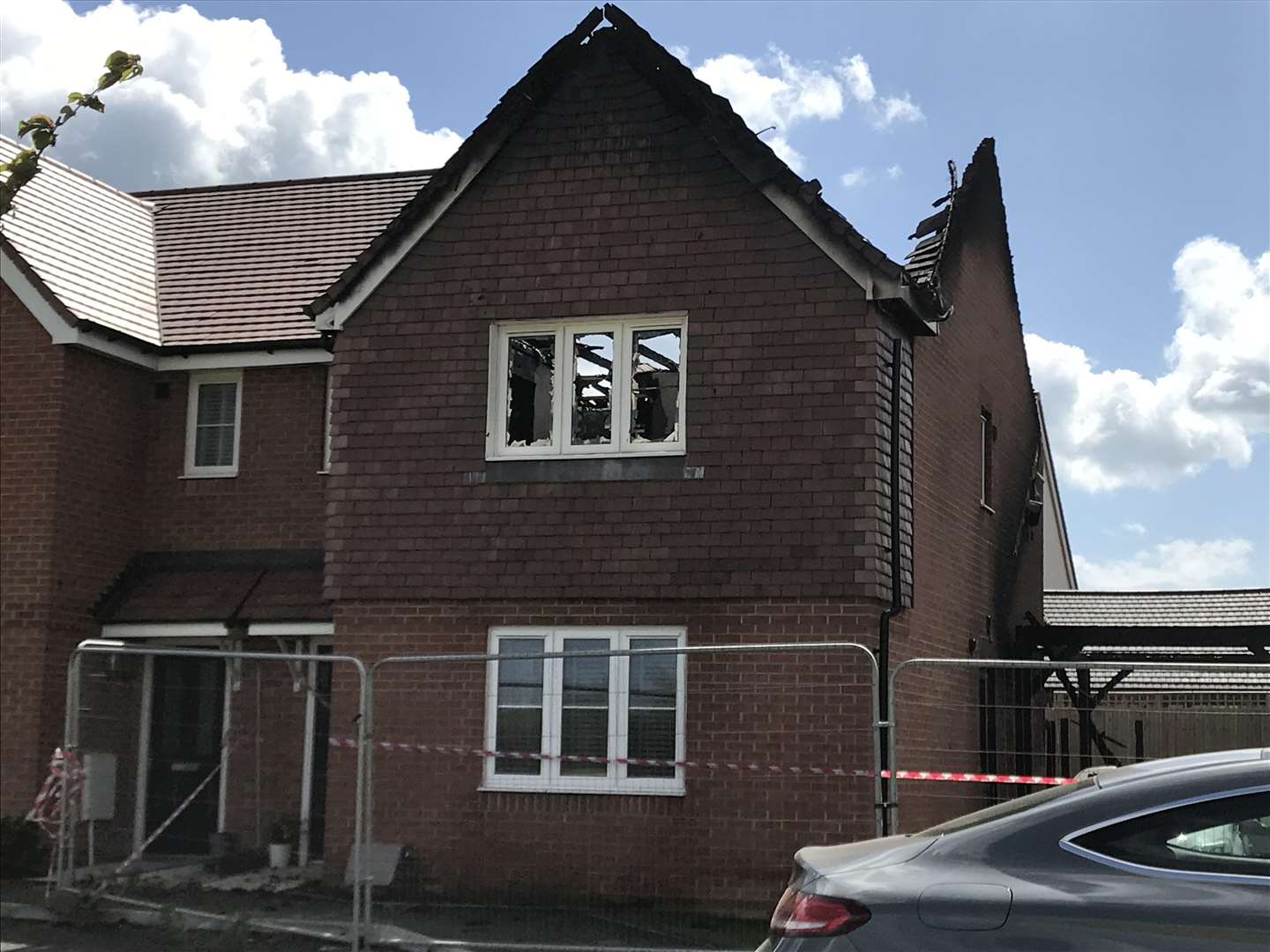 The fire engulfed two homes