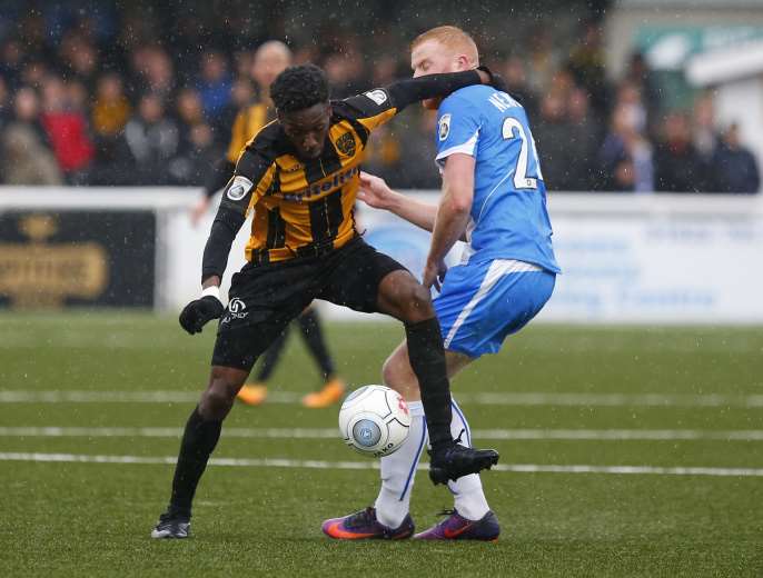 Blair Turgott tries to get the better of his man Picture: Andy Jones