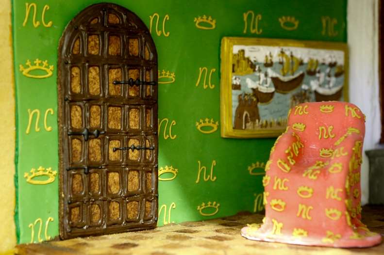 Inside the Queen's room in the gingerbread doll's house
