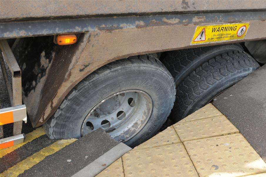 This lorry was going nowhere... after being swallowed up by the sinkhole