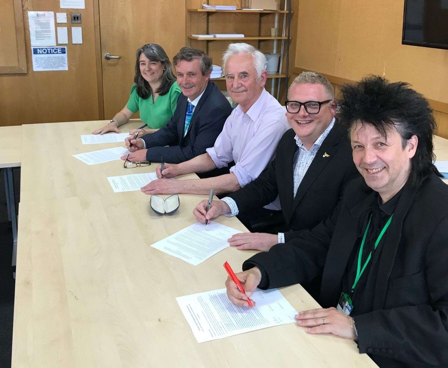 Swale Council's new Co-operative Alliance signing s a coalition agreement after ousting the Conservatives in May