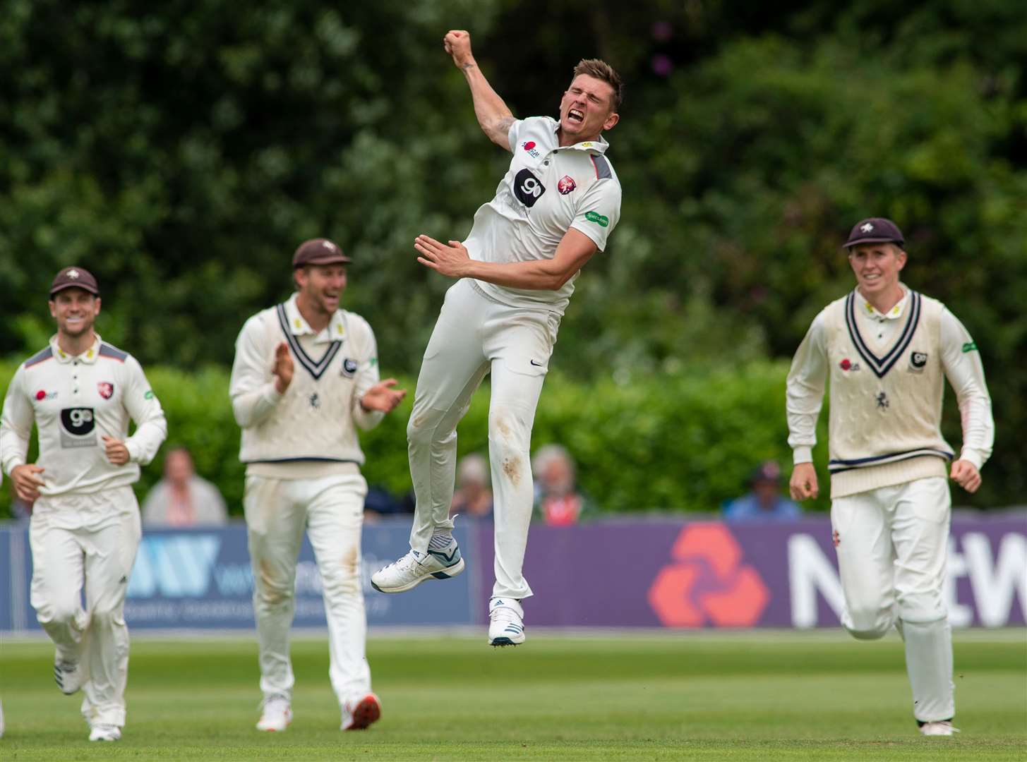 Harry Podmore celebrates the wicket of Tom Moores to complete his five-wicket haul in the second innings. Picture: Ady Kerry