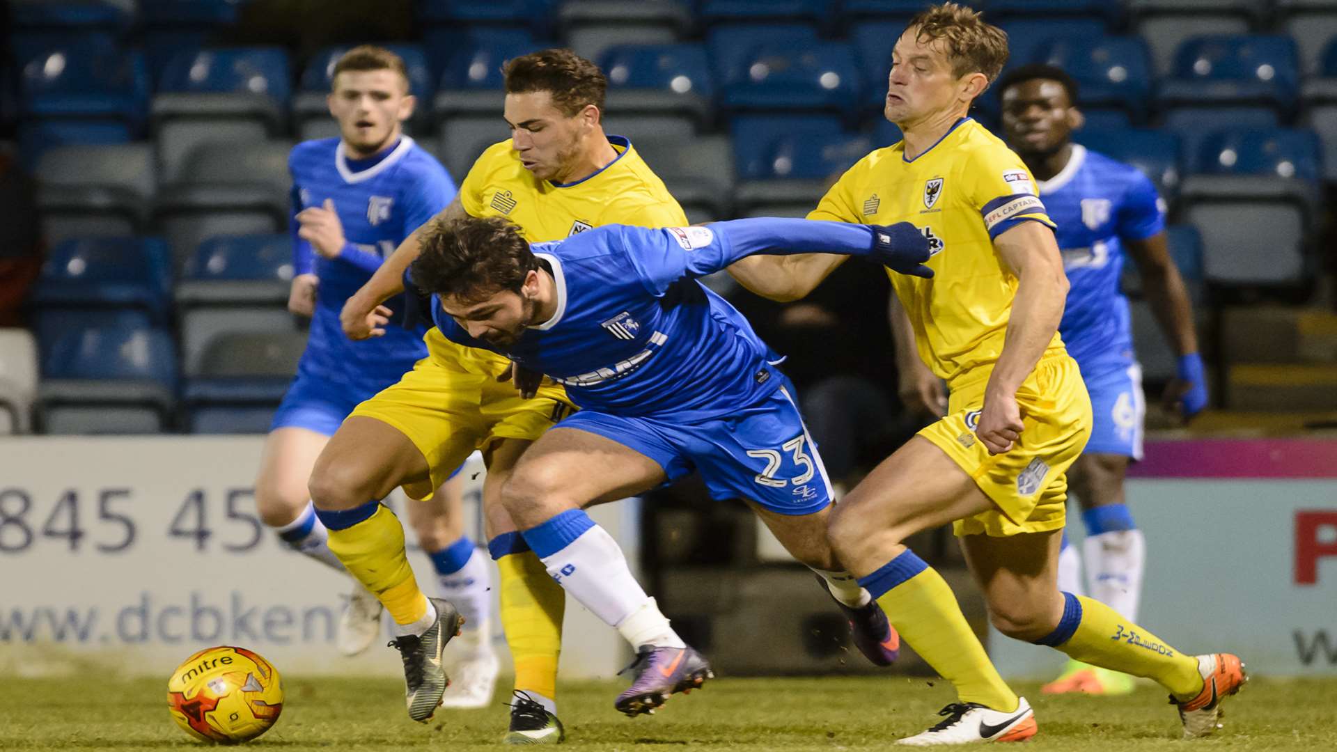 Bradley Dack forces his way past the Dons defence Picture: Andy Payton
