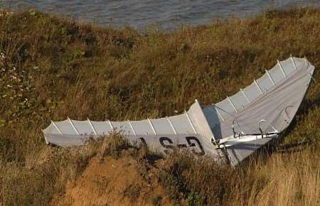 The detached wing of the microlight at the bottom of the cliffs in August 2004. Picture: MIKE SMITH