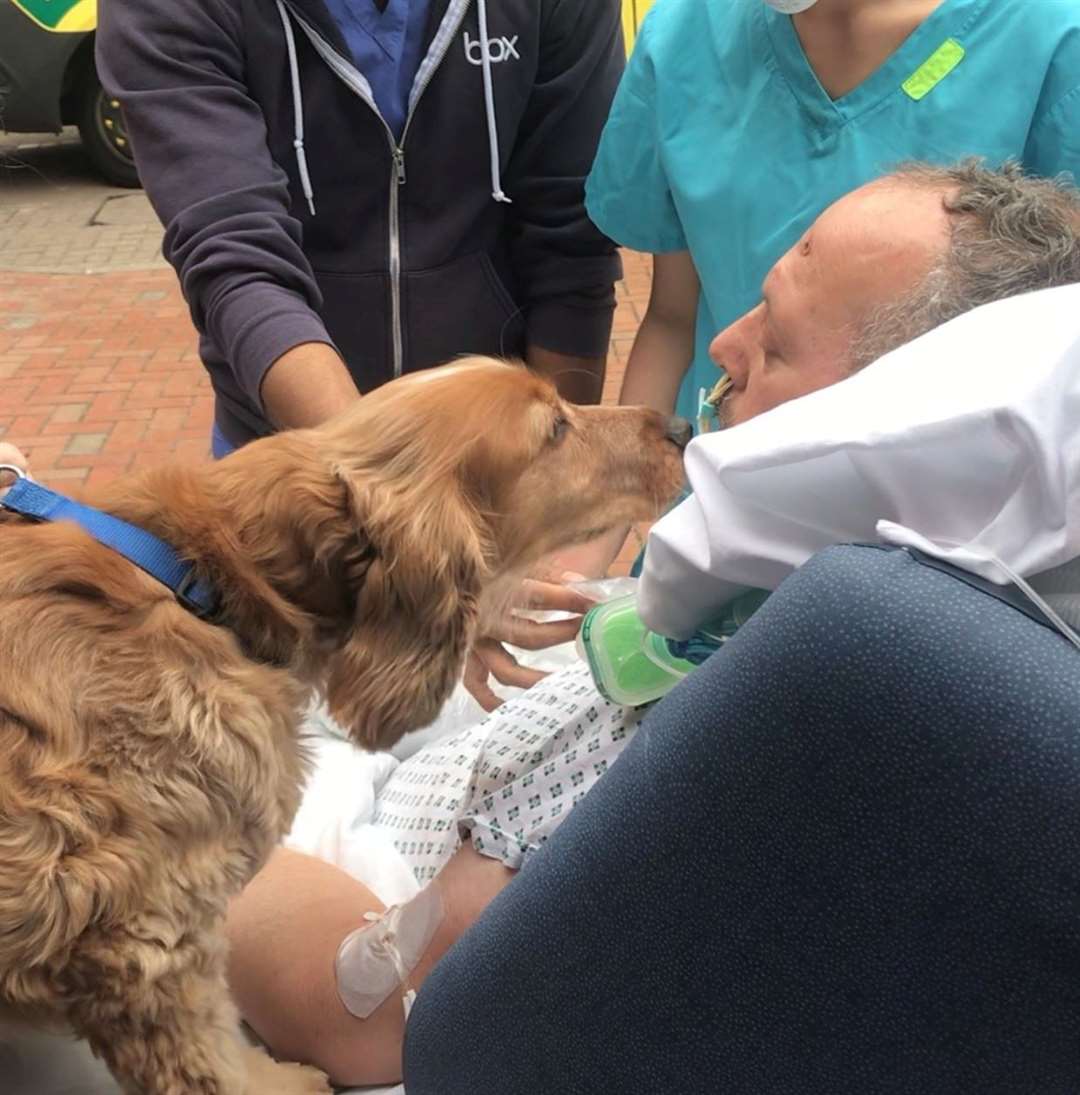 Jim got a visit from his beloved dog Caramel while at the William Harvey Hospital. Picture: EKHUFT