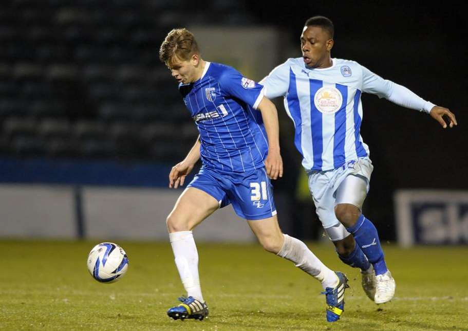 Peter Taylor handed Jake Hessenthaler his Gills debut Pic: Barry Goodwin