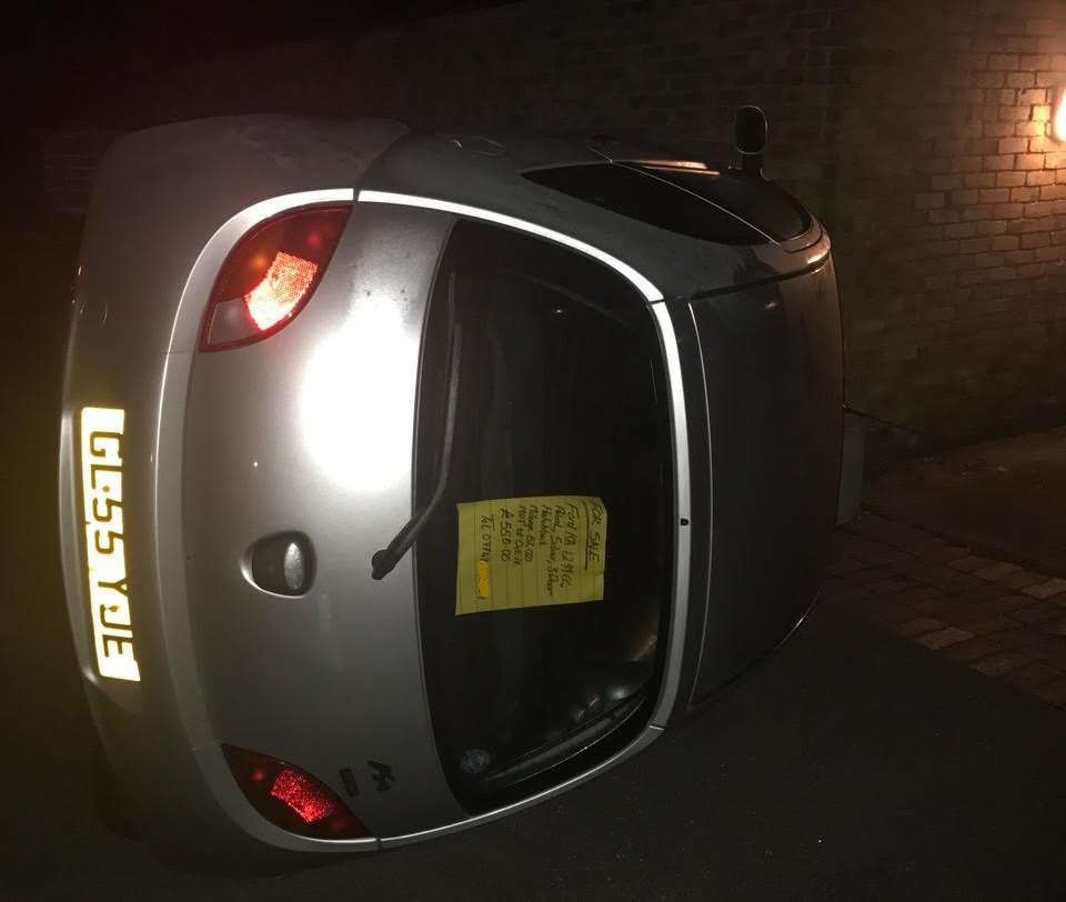 Vandals overturned this car as they ran amok in New Ash Green.
