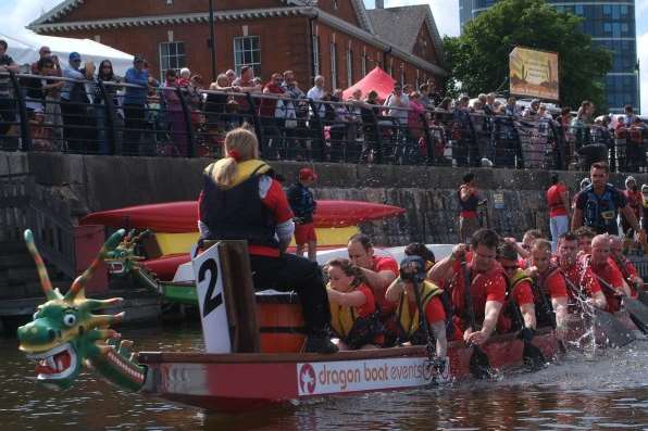Crowds gather to watch dragonboats on the Medway