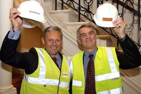 J B Leadbitter's Bob Rendell (left) and Denne Construction's Stephen Kingsman celebrate the deal