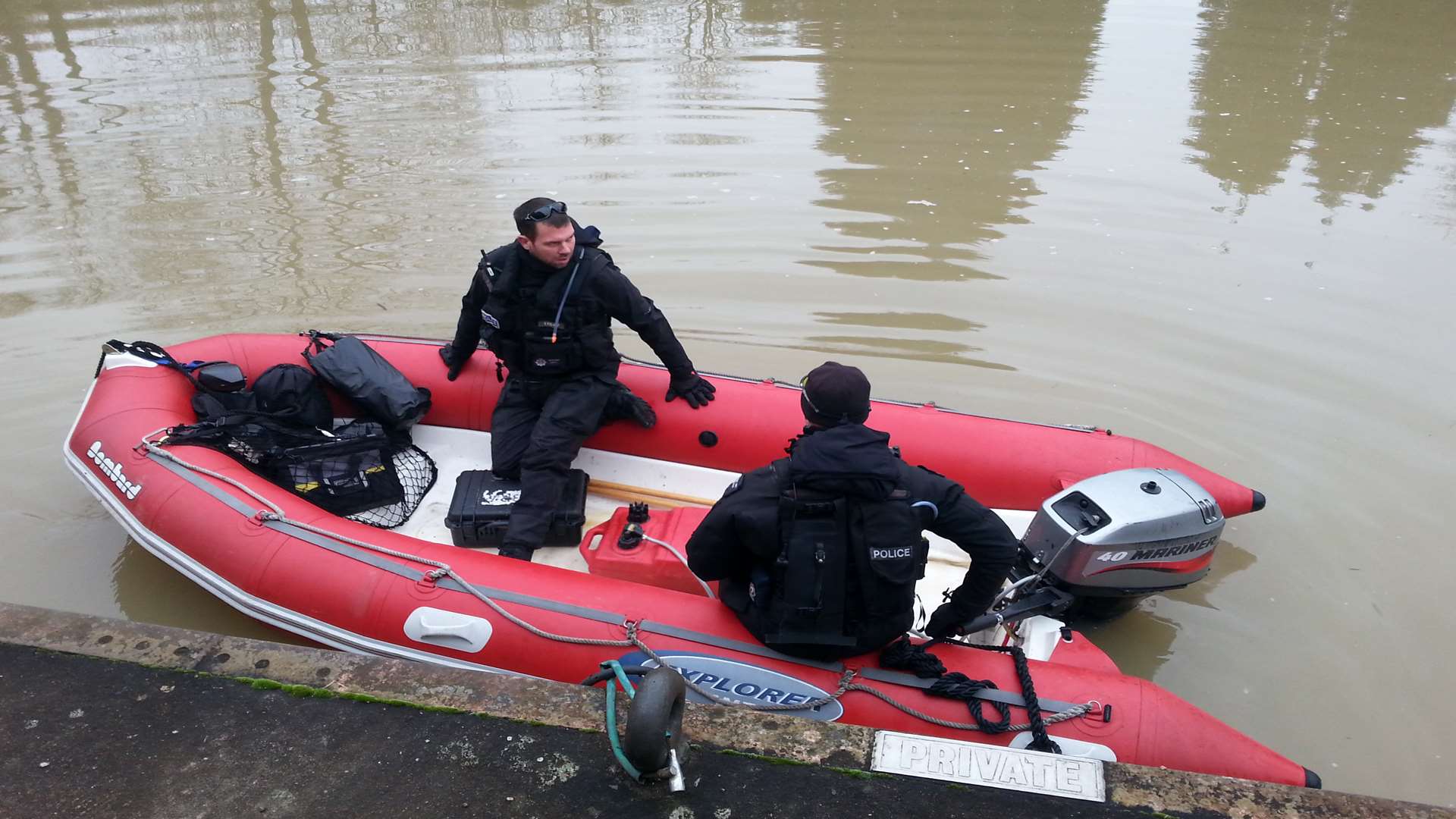 Officers from the police marine unit patrolling the river