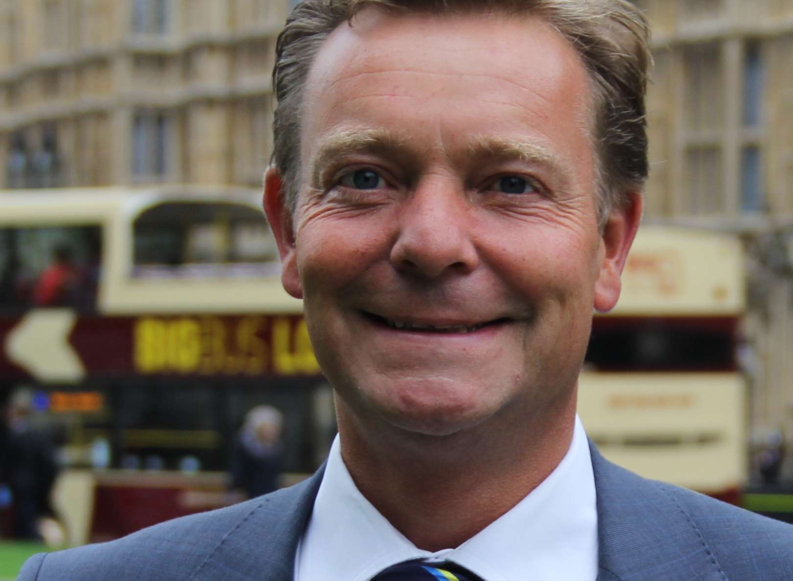 An aide to Craig Mackinlay MP is said to have been arrested