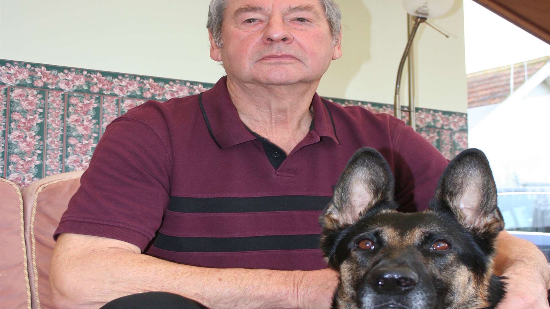 Roger Andrews with guard dog Sheba at their Birchington home