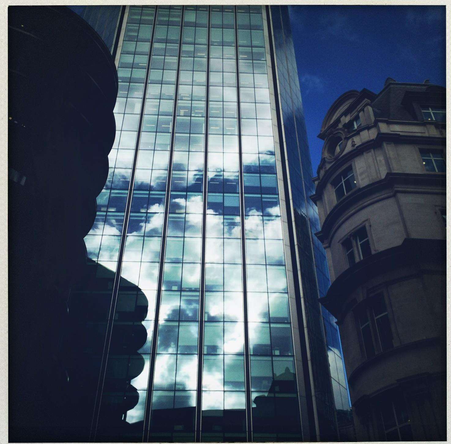 Justin Sutcliffe's a face in a cloud on a skyscraper