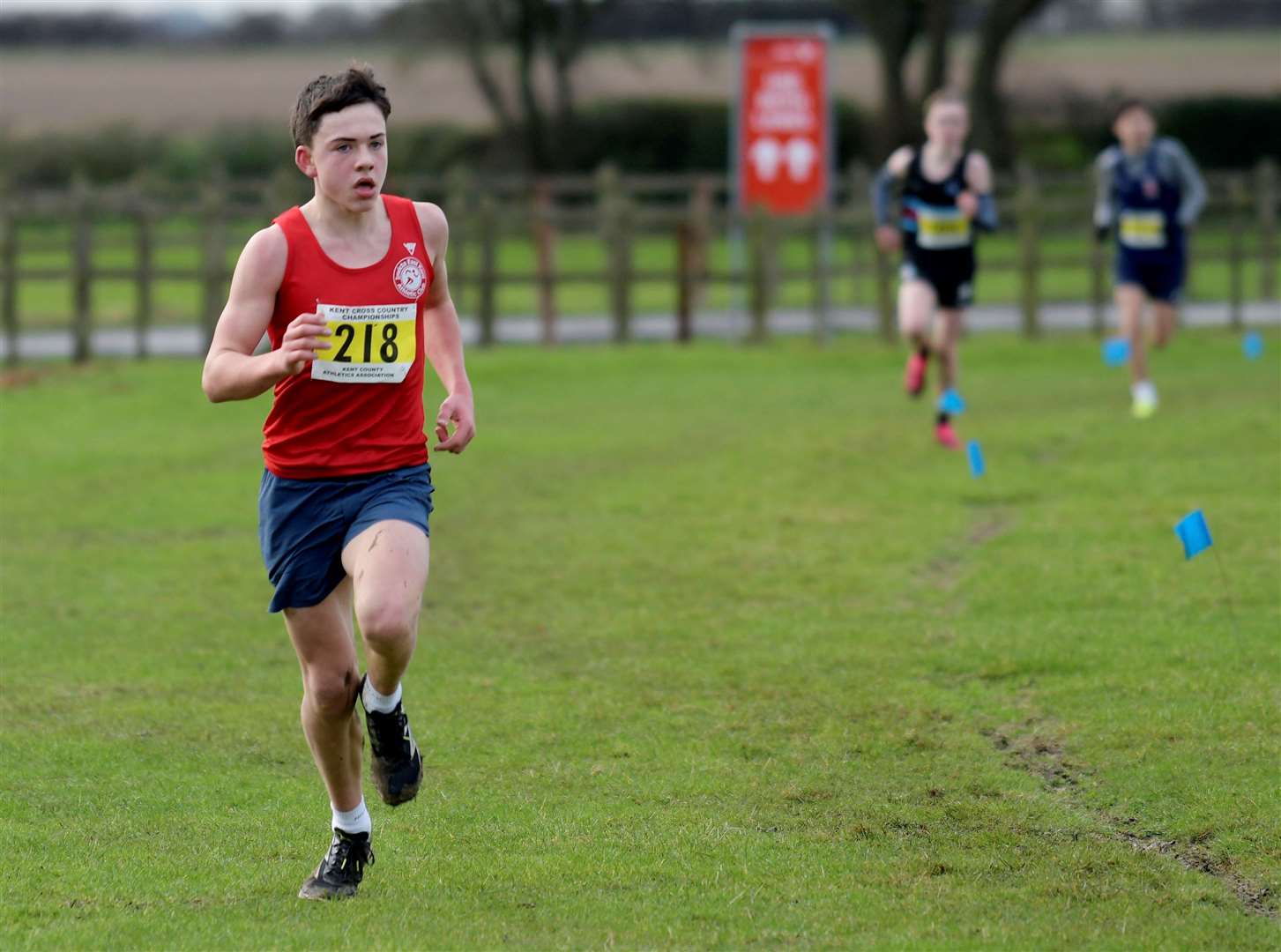 Jonson Foster flies the flag for Invicta East Kent in the under-15 boys’ race. Picture: Barry Goodwin