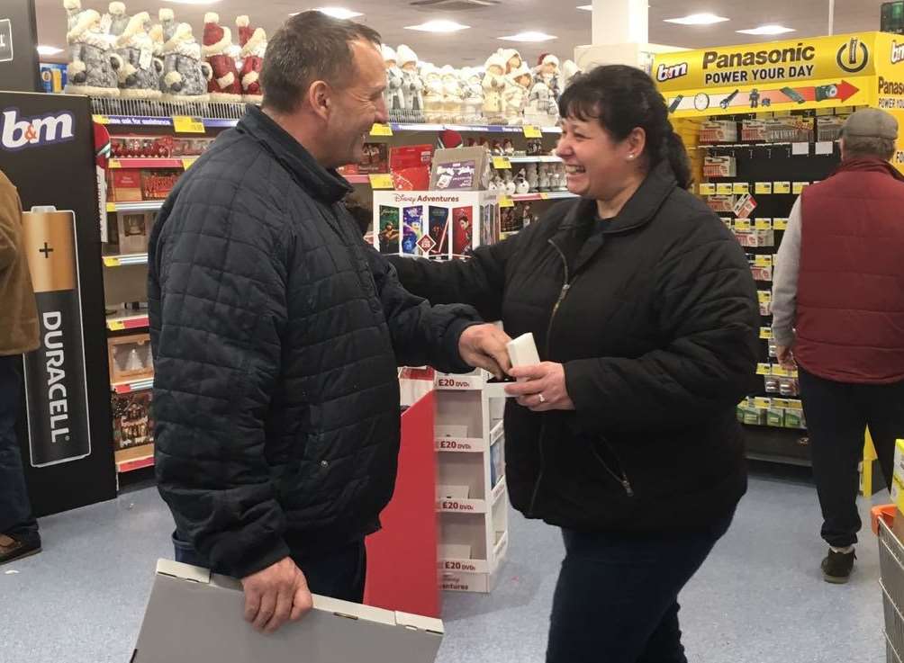 Ann Russell proposes to her boyfriend Robin at the B&M store in Gravesend