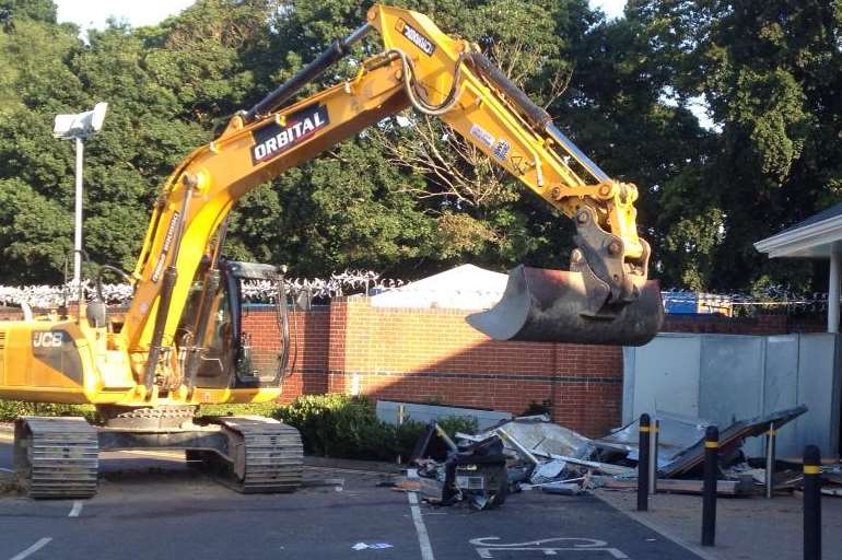 An abandoned stolen digger after being used to rip a cash machine from Tesco in Pembury. Picture: Craig Stroud