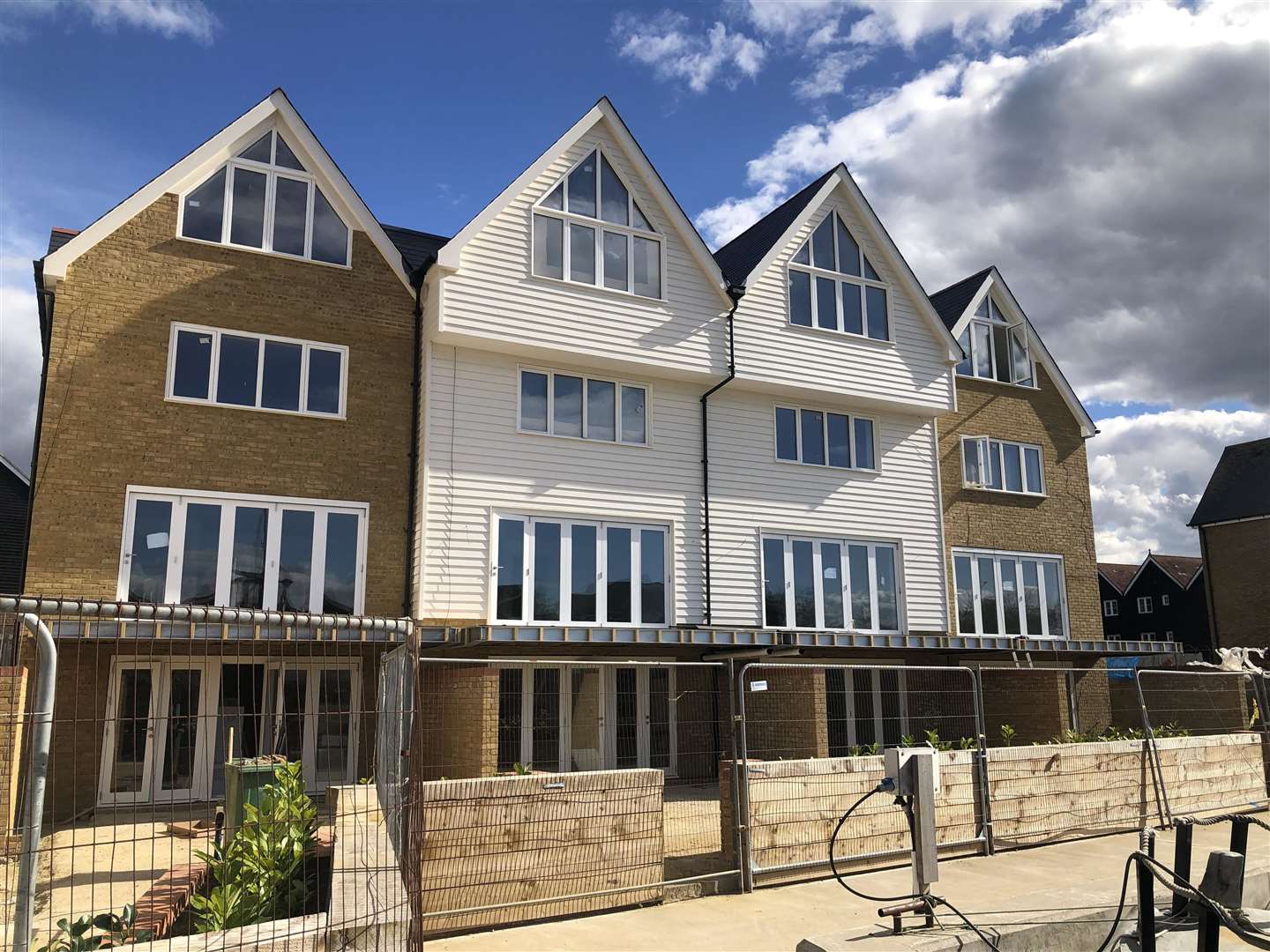 Luxury terraced houses nearing completion along Faversham Creek