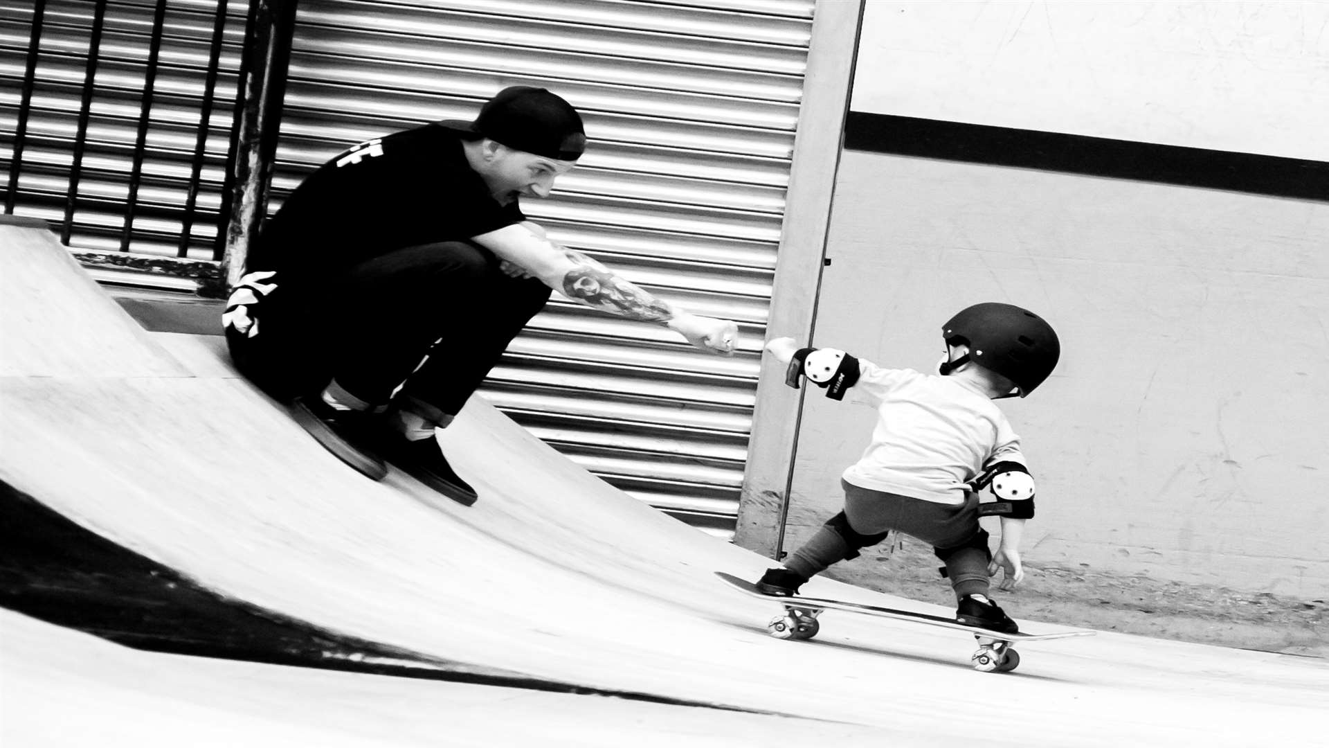 Sam and a young skateboarder