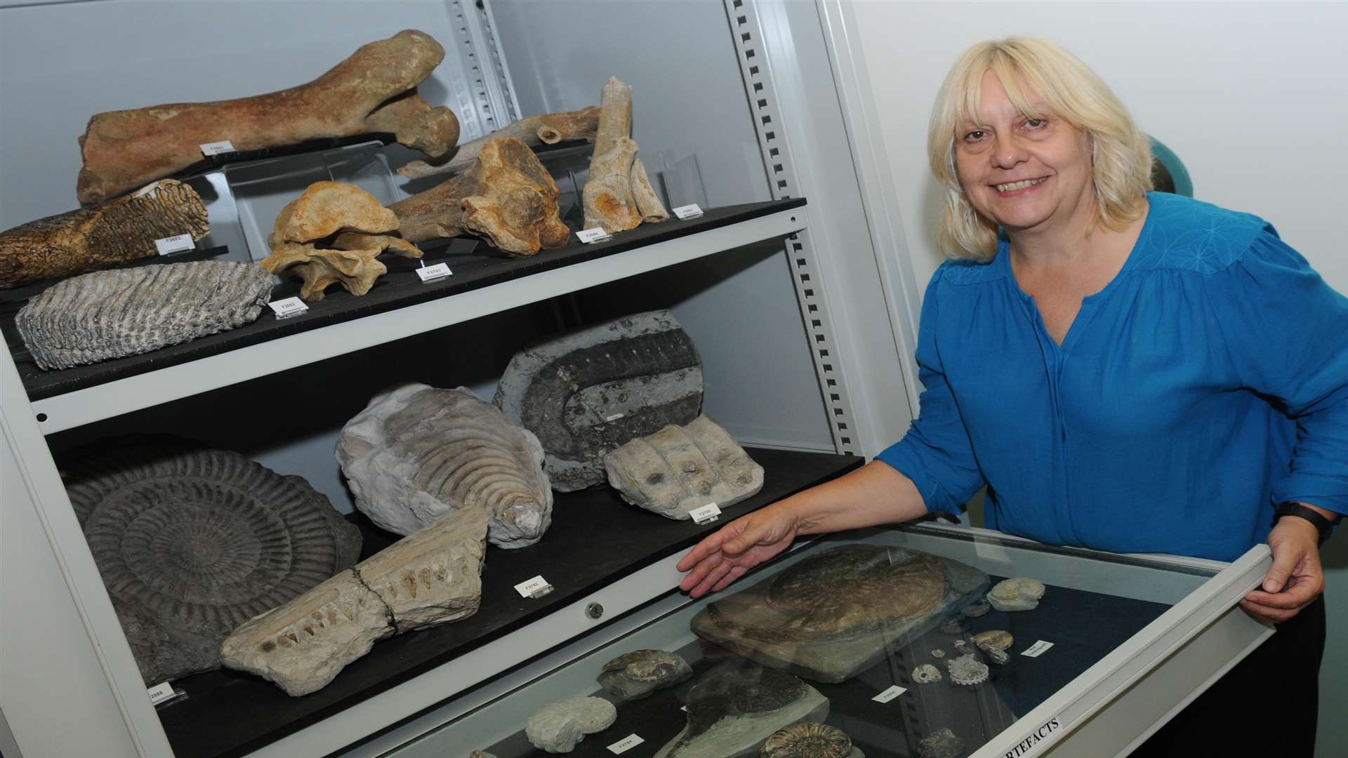 Gill Brear with a number of items found in Folkestone which will be on display at the new musuem