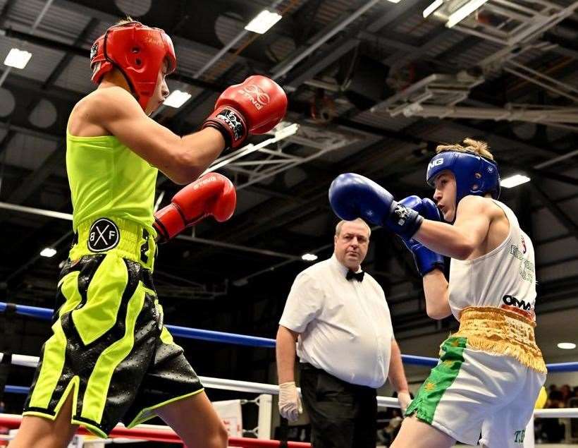 Bodyshots Boxing Gym's Tommy Dighton, white, takes on New Saints' Johnny Doe at the English Schoolboy finals