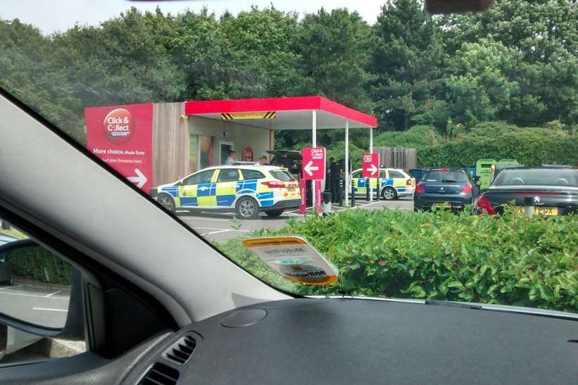 Police at Tesco in Hythe Road. Picture: Kent_999s