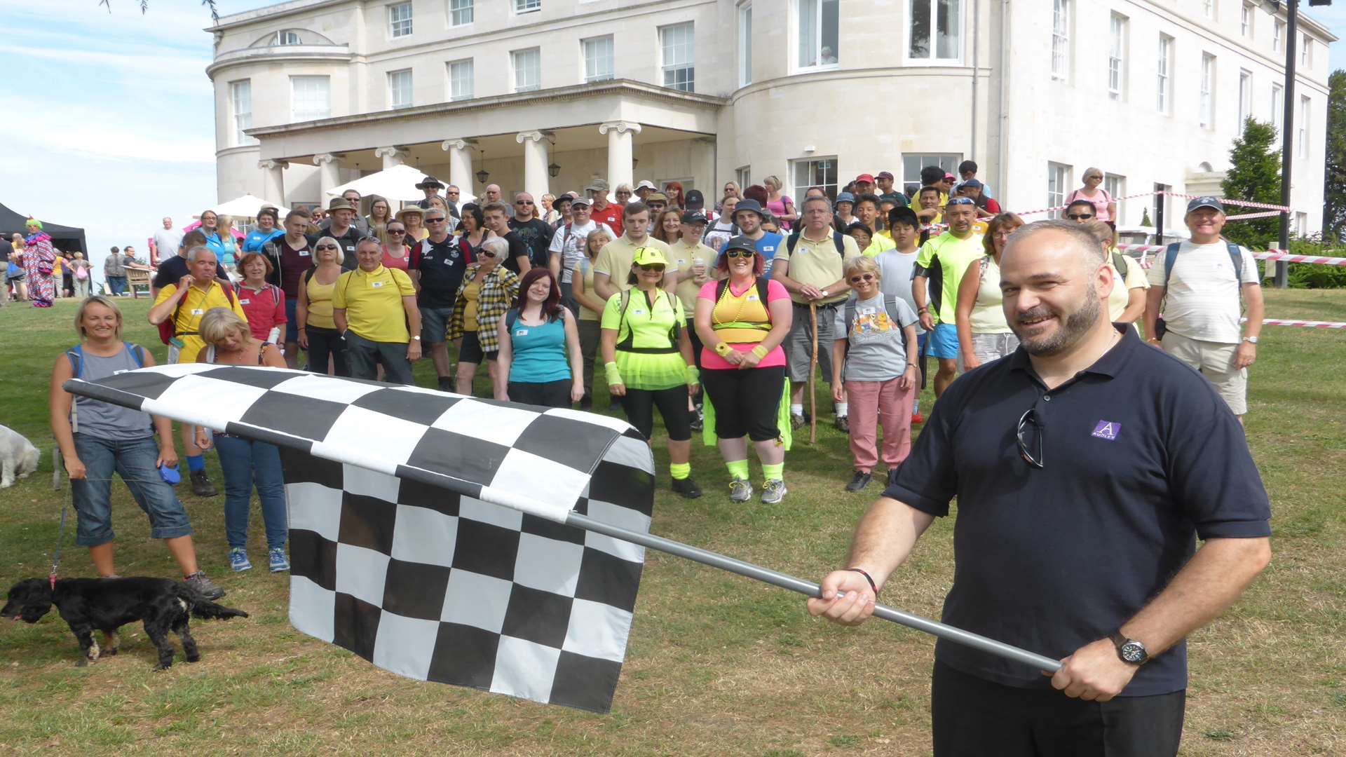 Shayne Brown, facilities manager at Mote House, starts the 20th anniversary KM Charity Walk. More than 400 walkers took part raising £20,000.