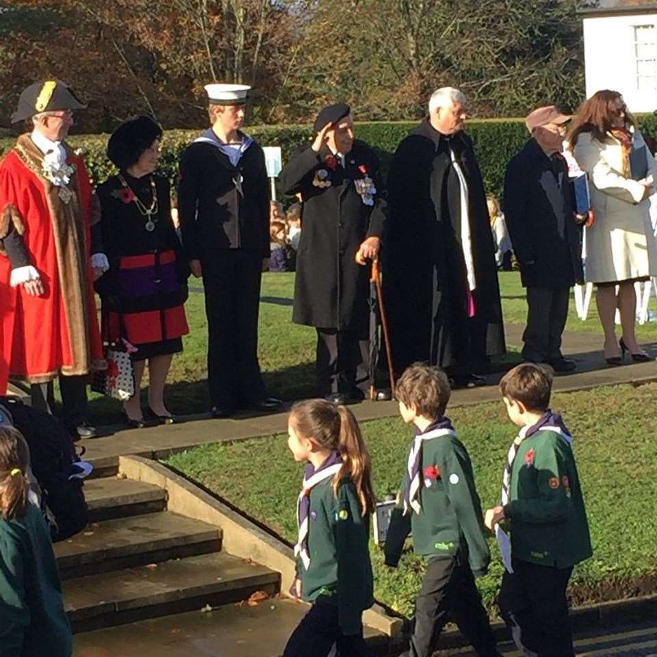Pat Moore takes the salute at one of the Sevenoaks Remembrance Parades