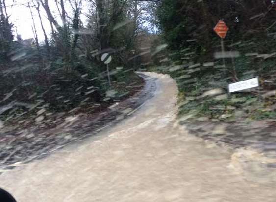 Water running down from the country lanes off the Alkham Valley Road are contributing to the floods. Picture: John Sheridan