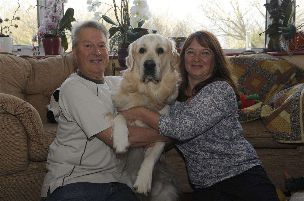 Snow lover Sharon Cairns is going on a husky sledding charity expedition to raise money in memory of her mother Rosemarie. She is pictured at home in Ramsgate with husband Mick and dog Dexter.