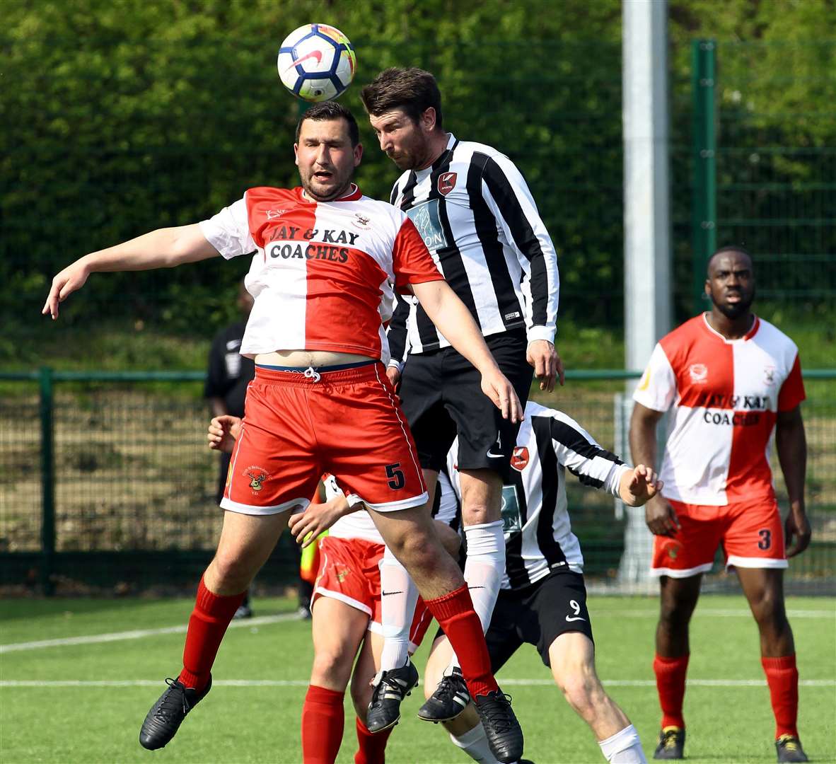 K Sports (black and white) in action against Erith & Belvedere on Saturday Picture: Sean Aiden