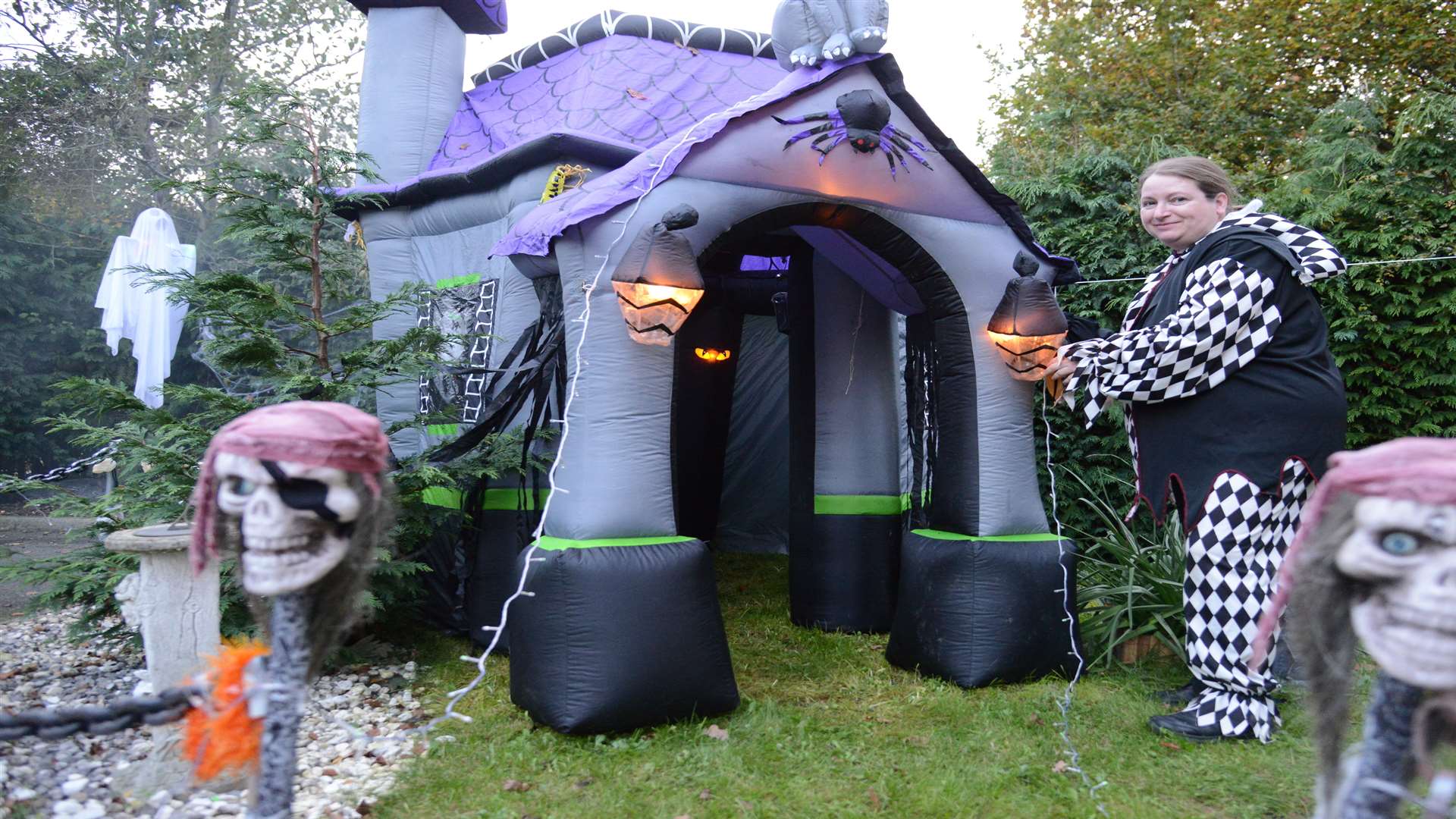 Linda at her spooky Halloween house