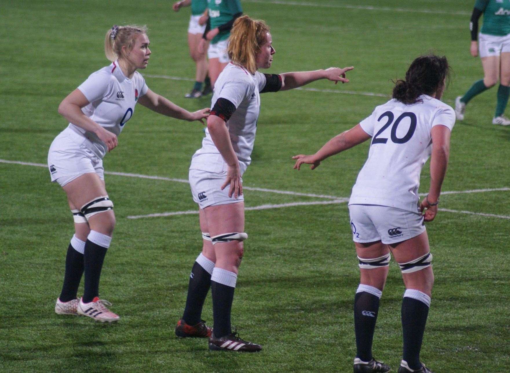 Rosie Galligan, left, in action for the Red Roses against Ireland